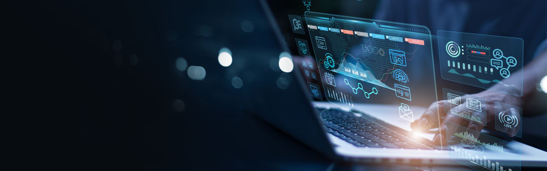 Laptop mit digitalen Werbedashboards und Analysegrafiken zur Steuerung von SEA-Kampagnen